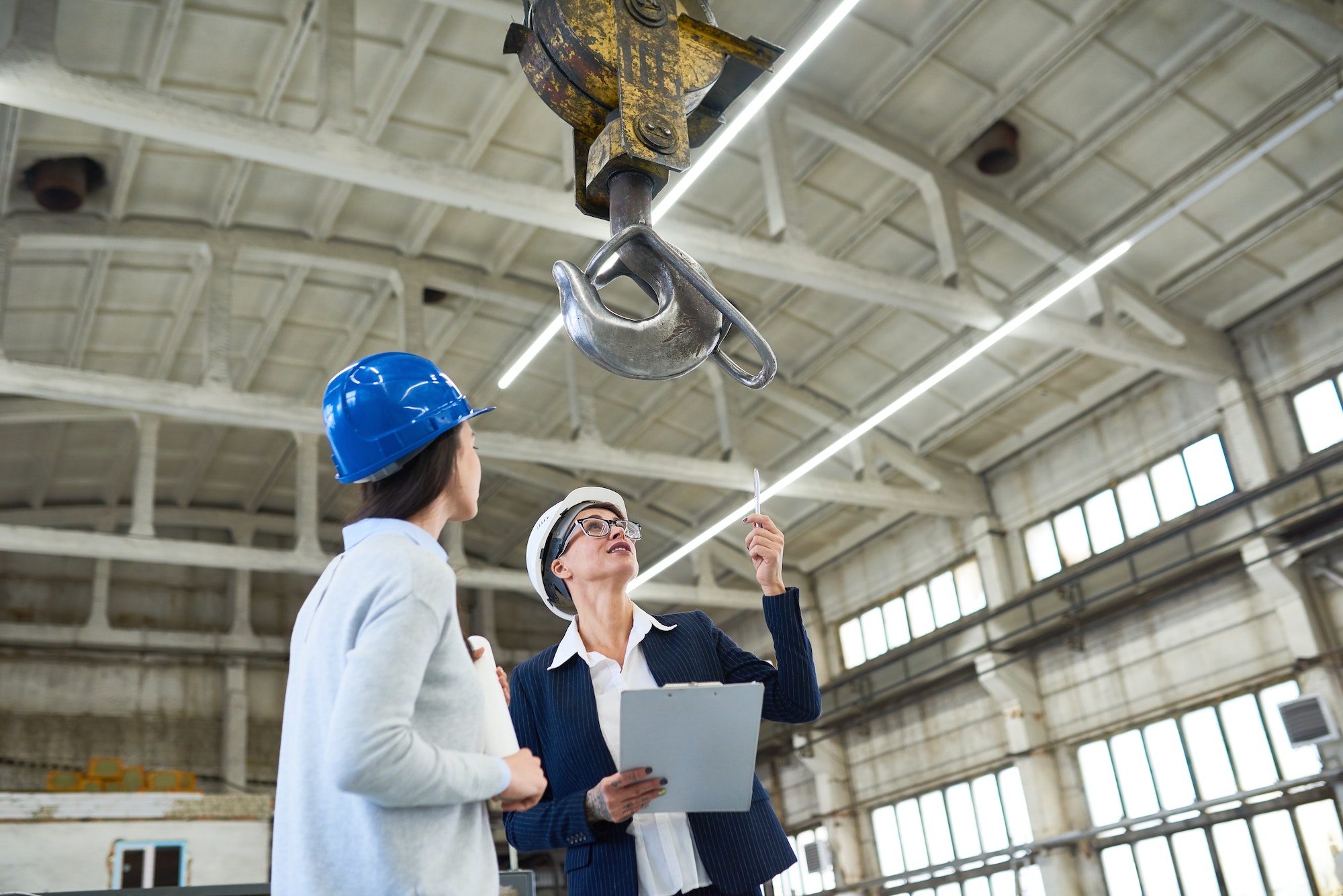 Female building contractors visiting construction site